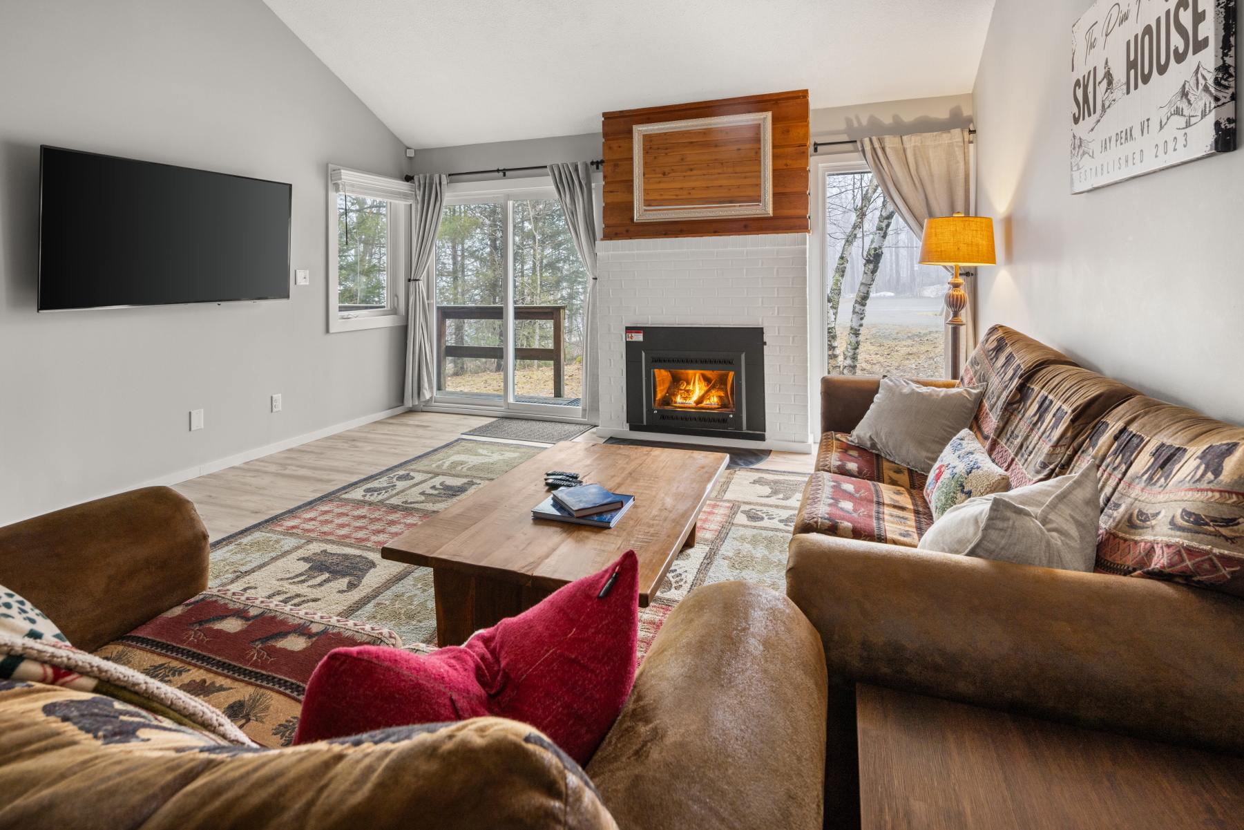 Luxury living room with fireplace and 60" TV