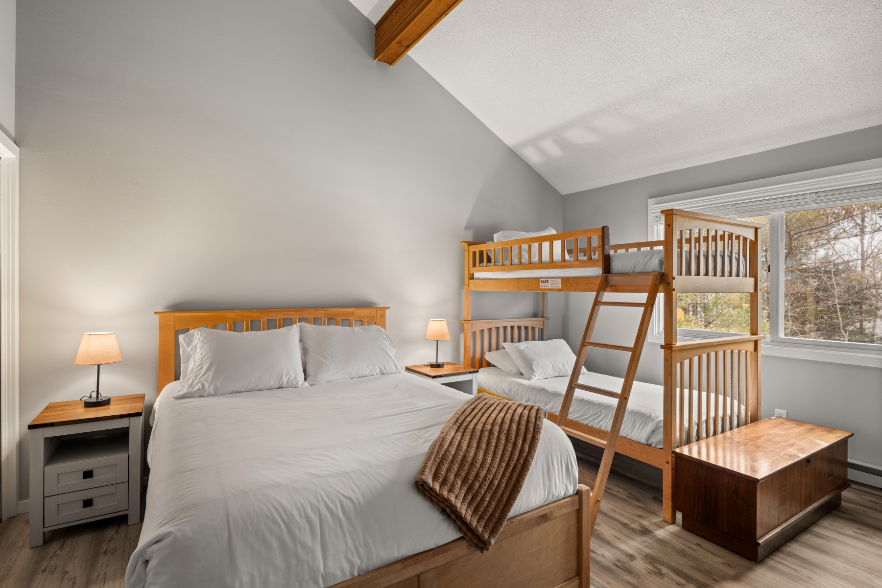 Bedroom with queen and twin-over-twin bunk-bed